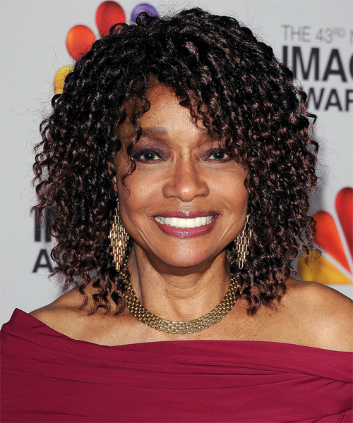 Beverly Todd Medium Curly   Black    Hairstyle with Layered Bangs