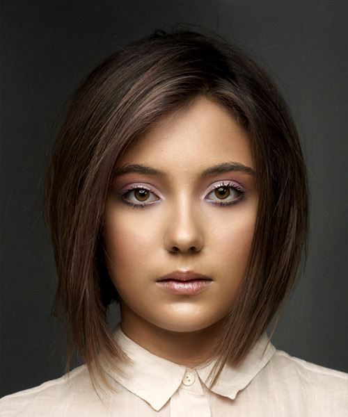 Short Dark Brunette Bob Haircut With Blunt Cut Bangs And Brunette Highlights